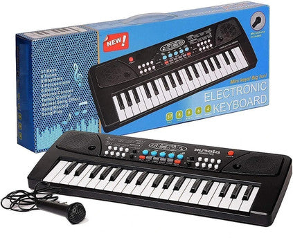 Electronic keyboard with microphone and packaging on a white background