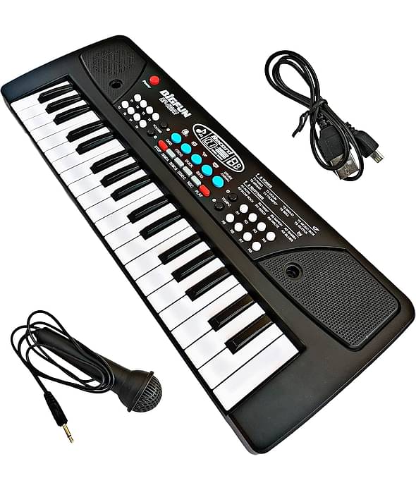 Keyboard with microphone, cable, and USB adapter on a white background