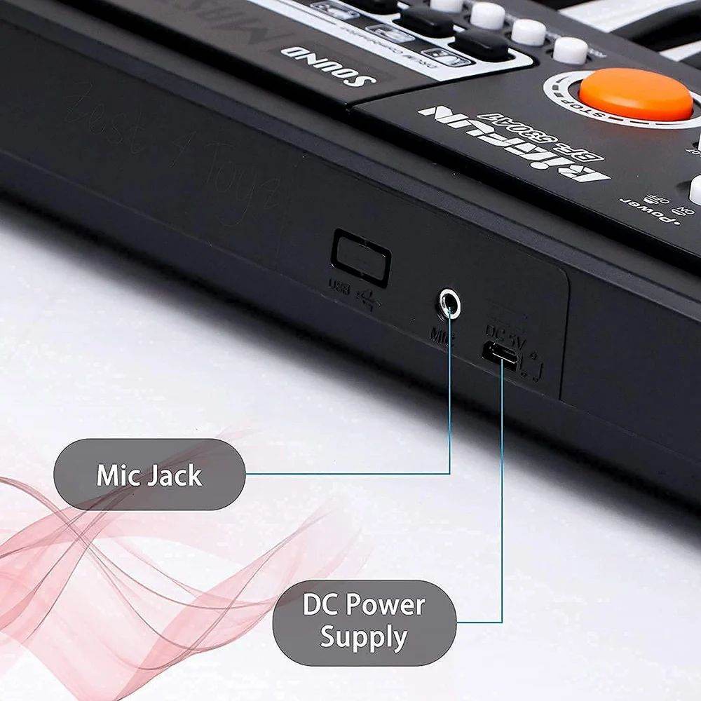 Close-up of mic jack and DC power supply ports on 49 key electronic keyboard for kids by T-Rex the toyland Sitamarhi