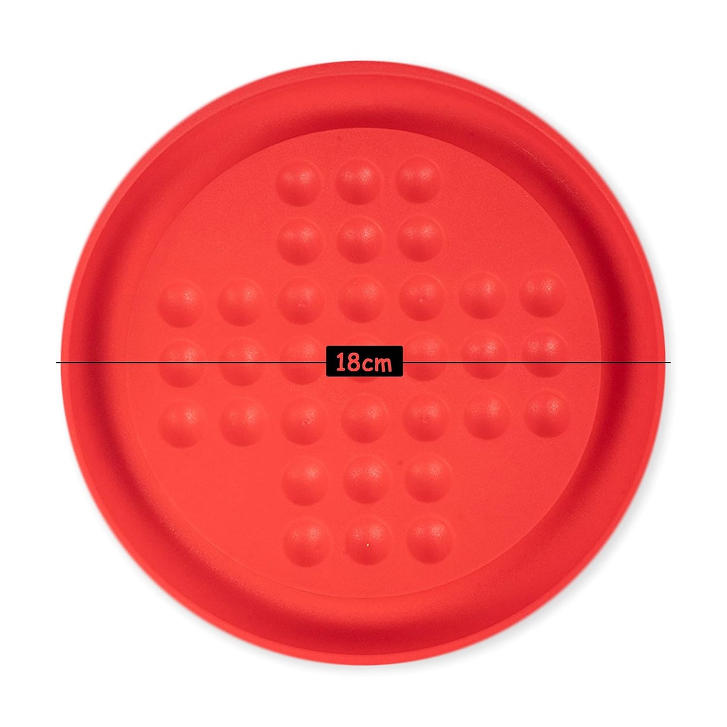 Red circular object with textured surface