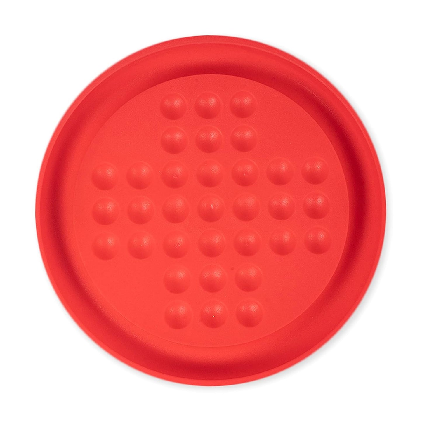 Red silicone trivet with textured surface on a white background