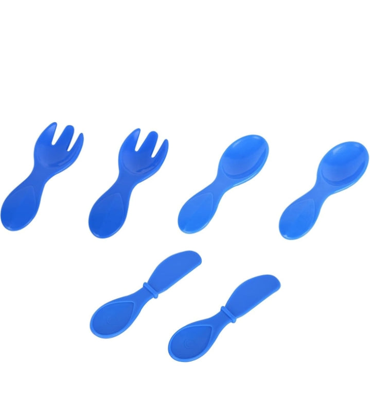 Set of blue plastic forks and spoons on a white background