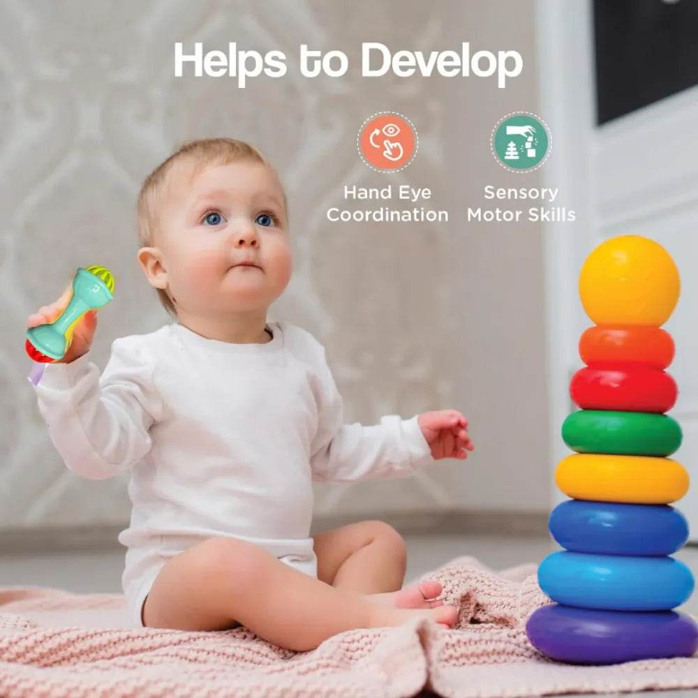Baby holding safari rattle set for babies to develop hand eye coordination and sensory motor skills