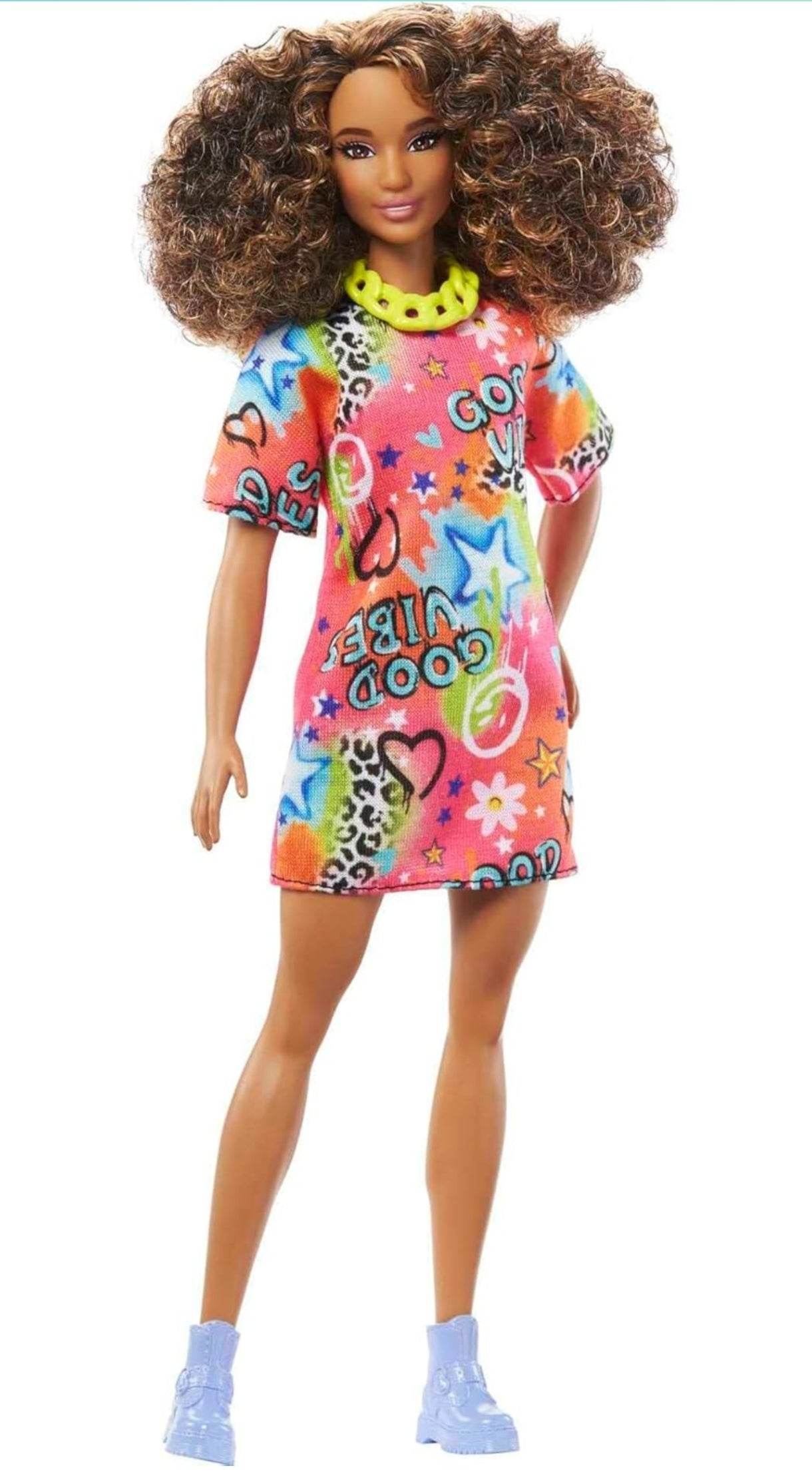 Barbie doll with curly hair wearing colorful dress and blue shoes from Barbie Fashionista set for girls