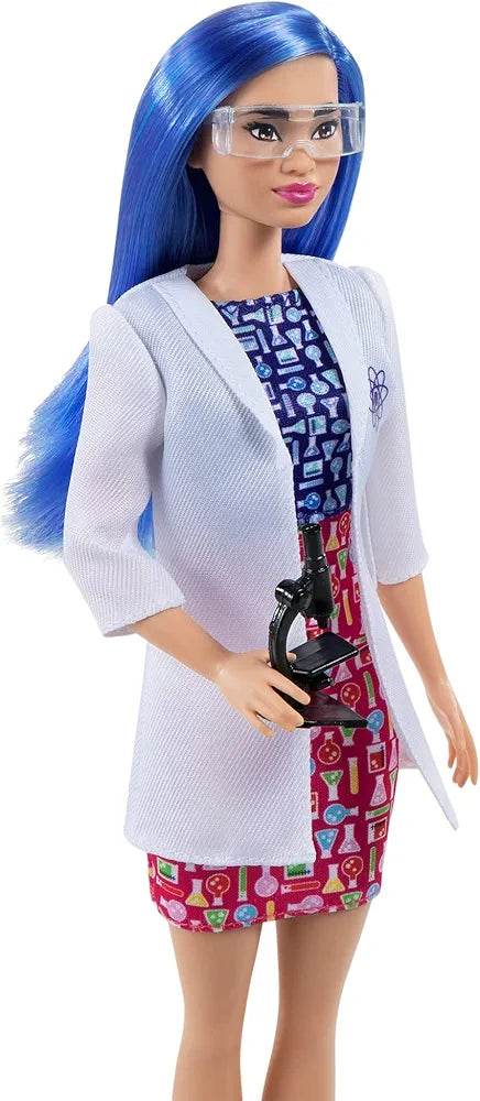 Barbie scientist doll with blue hair wearing safety glasses, white lab coat, and holding a microscope