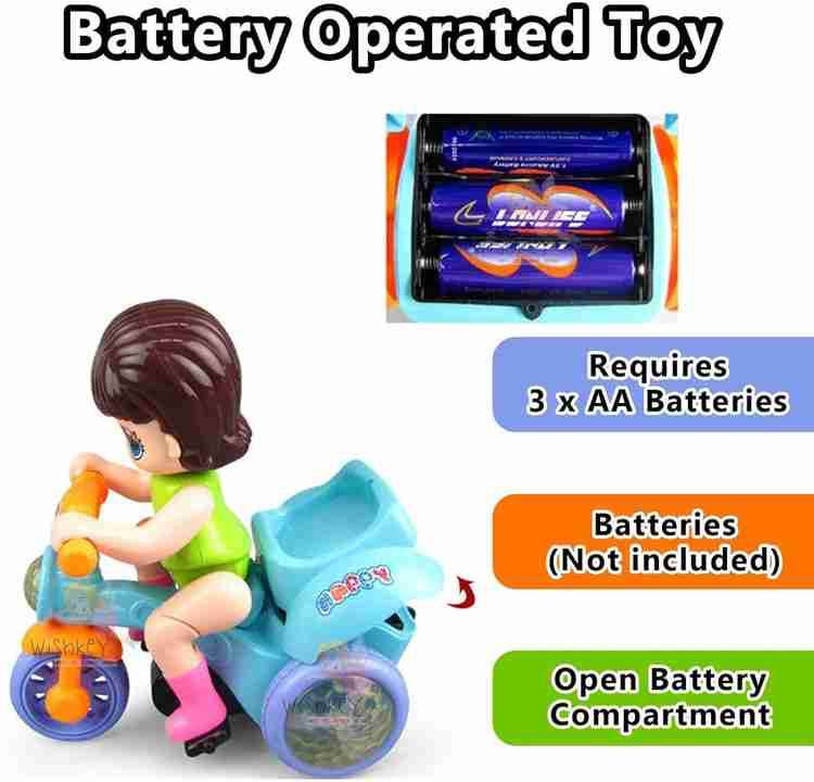 Battery operated stunt tricycle toy with a child figure riding in green and blue colors by T-Rex the toyland Sitamarhi