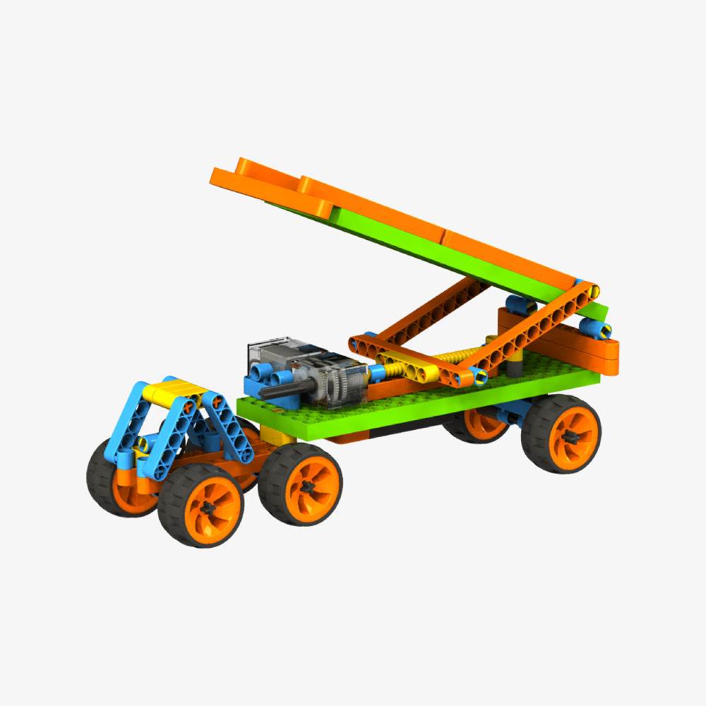 Colorful STEM construction toys for kids building a model vehicle with orange, green, blue, and black parts