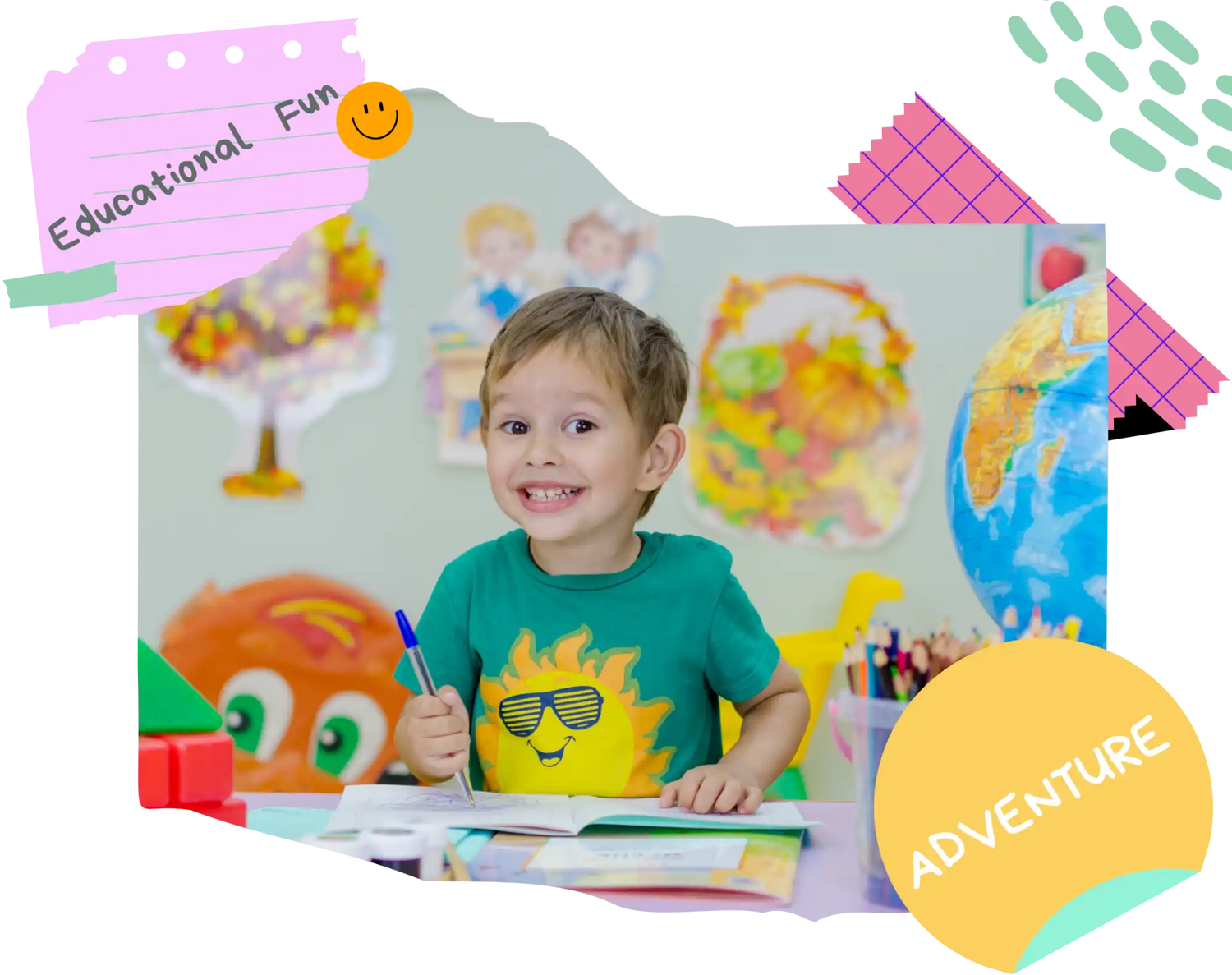 Smiling boy at desk.