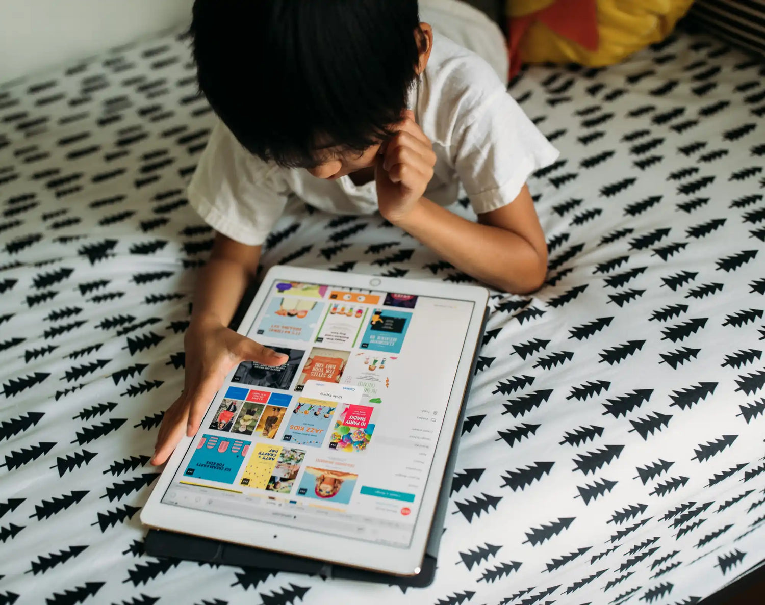 Boy using a tablet.