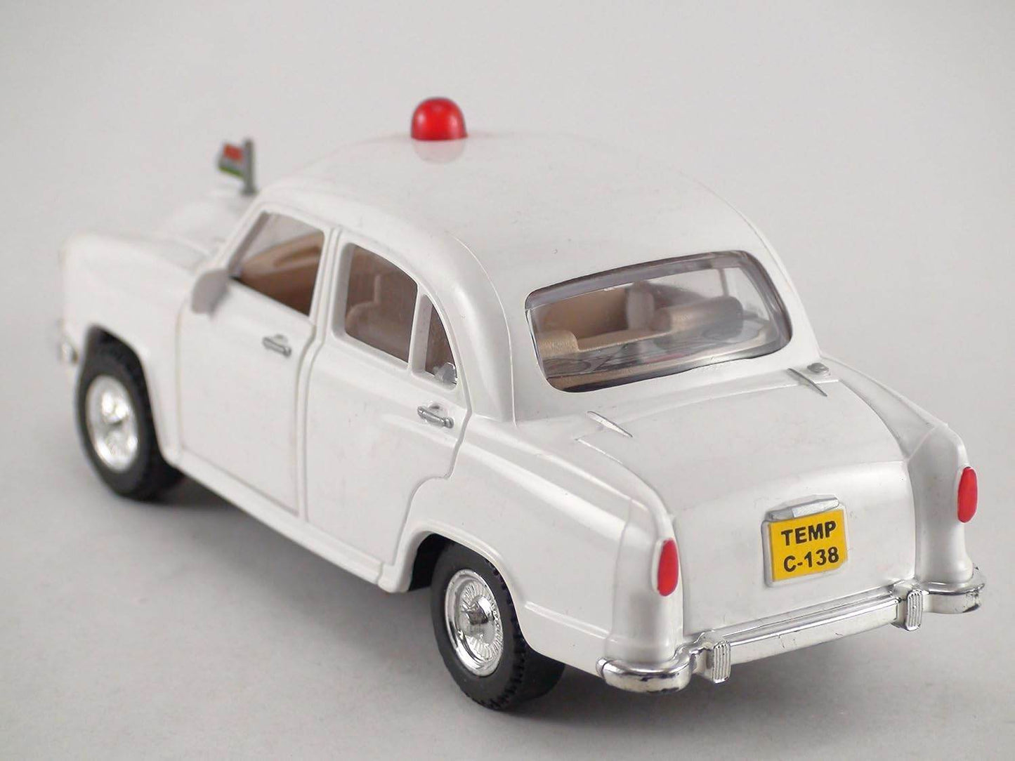 White Centy Ambassador car toy with red siren and chrome details by T-Rex the toyland Sitamarhi