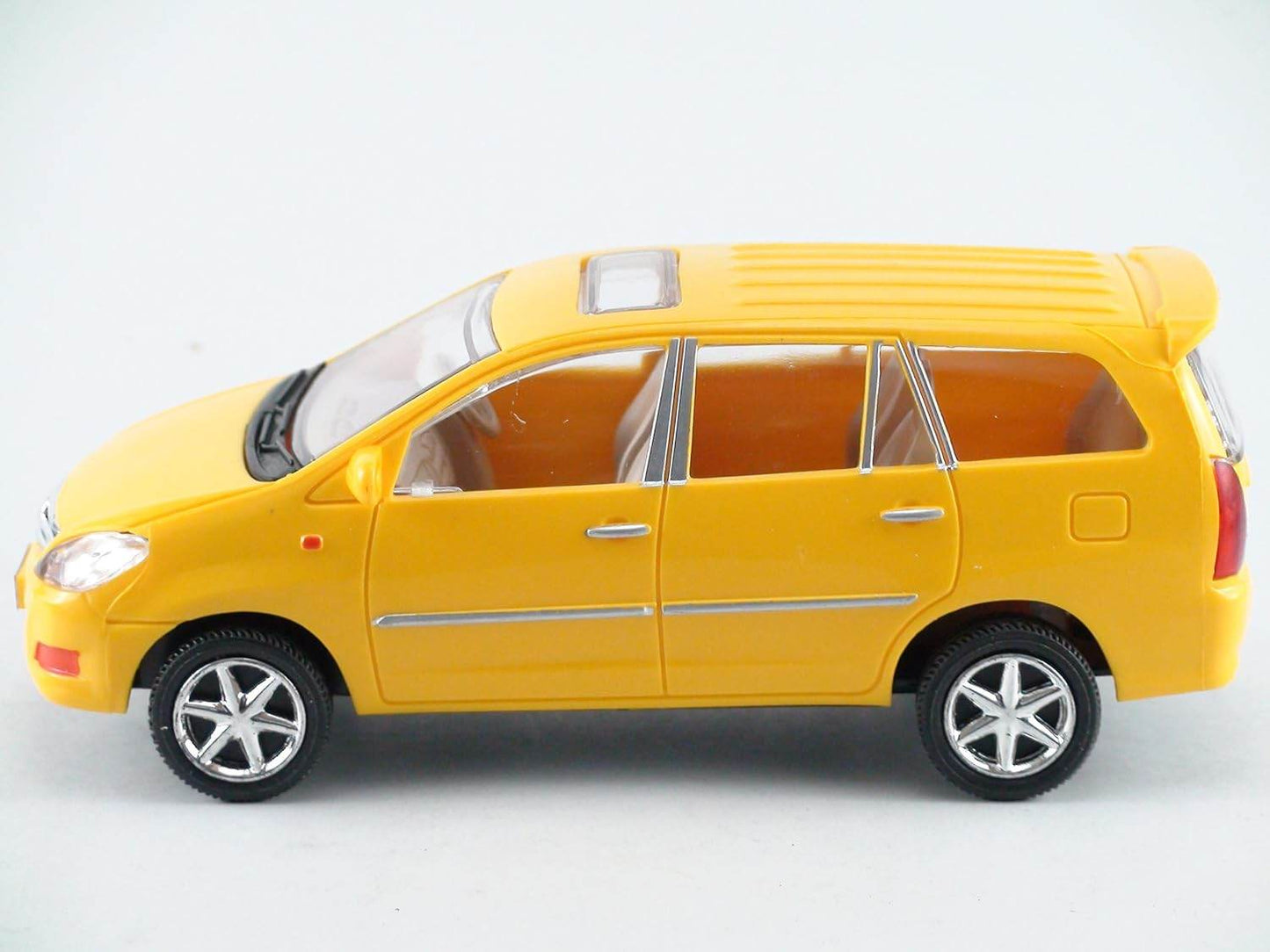 Yellow Centy Toys Innova scale model car with detailed design and silver wheels