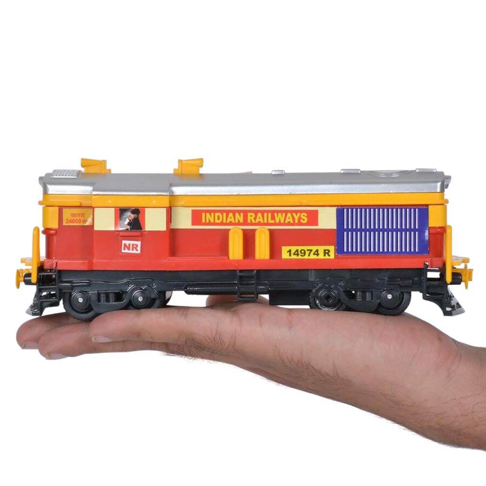 Centy Toys locomotive engine model of Indian Railways held on a hand by T-Rex the toyland Sitamarhi