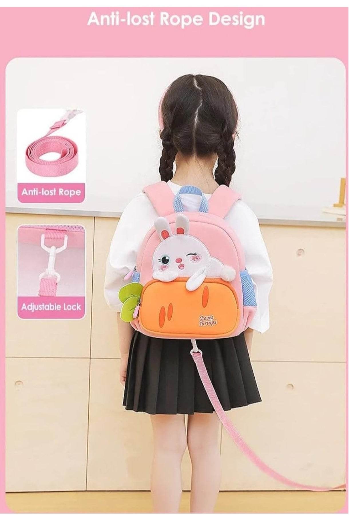 Cute rabbit backpack for toddlers in pink and orange with anti-lost rope worn by a child