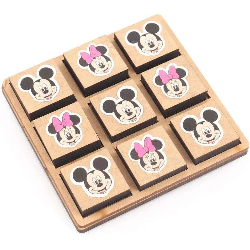 Disney cartoon tic tac toe game featuring wooden blocks with Mickey and Minnie Mouse faces on a wooden board