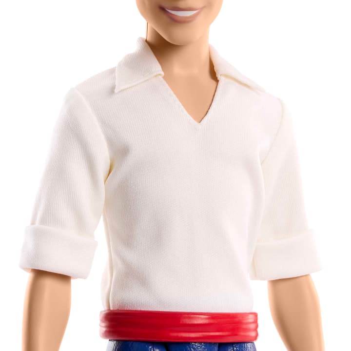 Close-up of Disney Prince action figure wearing white shirt with rolled sleeves and red belt