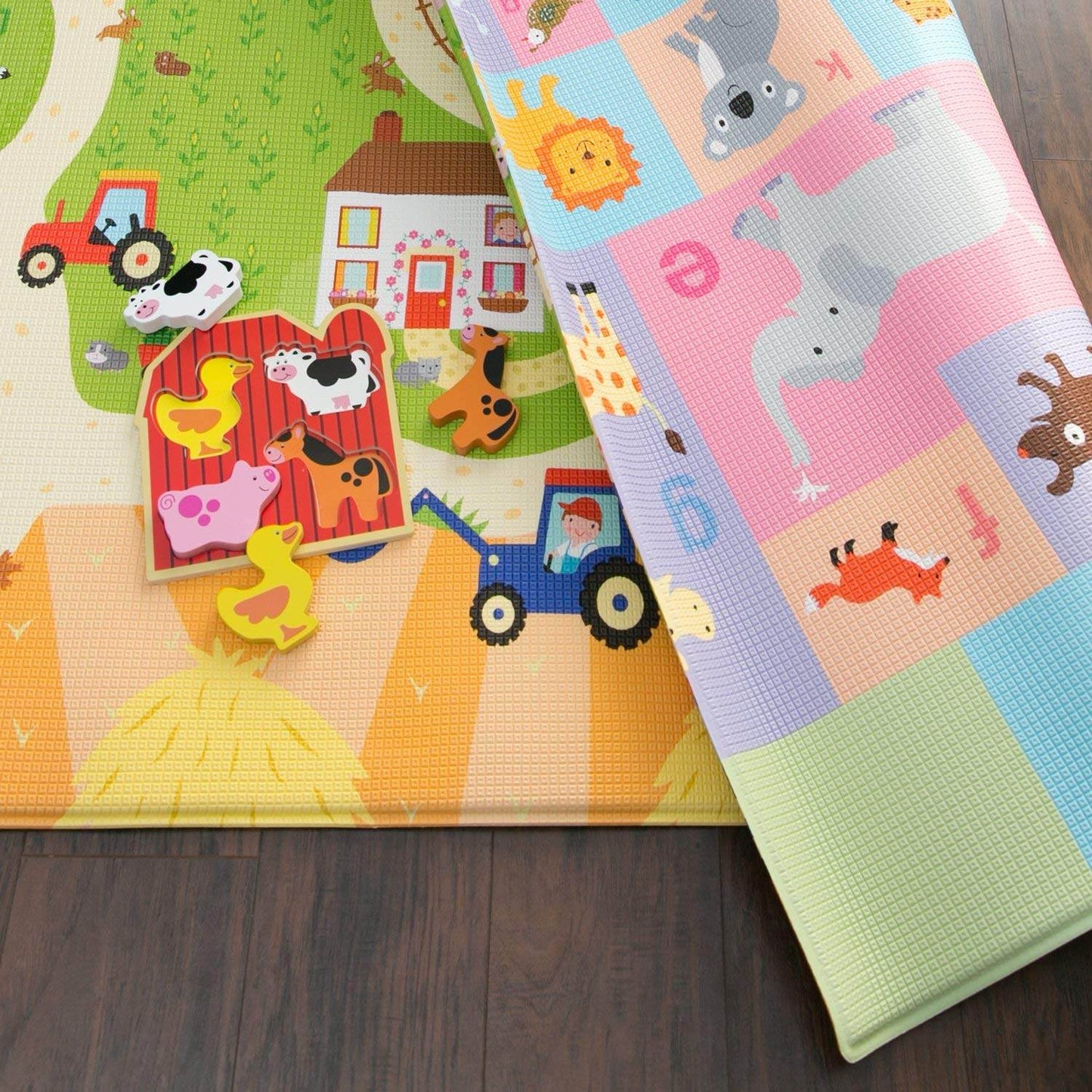 Unimates farm themed baby mat with colorful animal and tractor designs for infant play and development