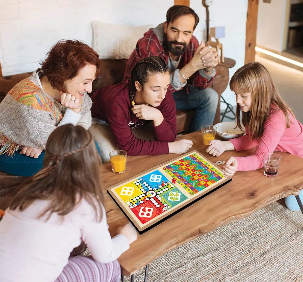 Family playing Itoys fastest finger first game colorful board game on wooden table indoors