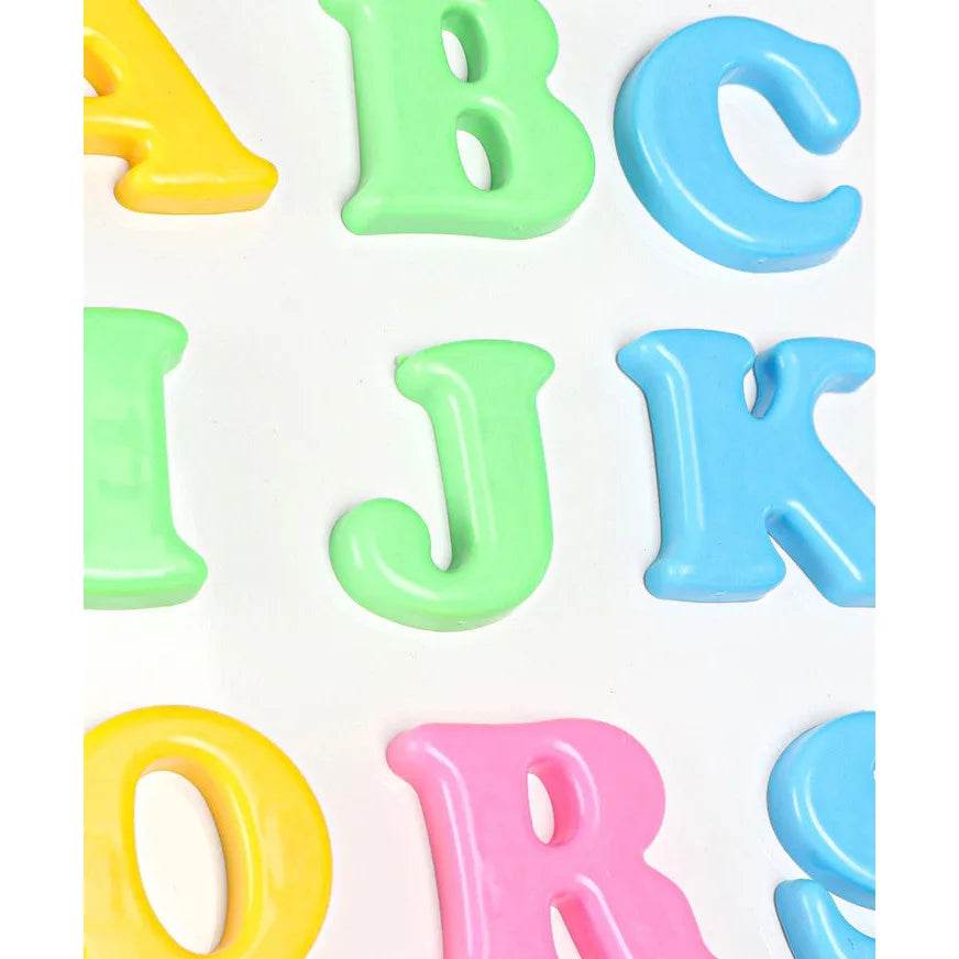 Colorful magnetic alphabet letters on a 2in1 magnetic whiteboard and chalkboard Flexi easel by Prem Ratan