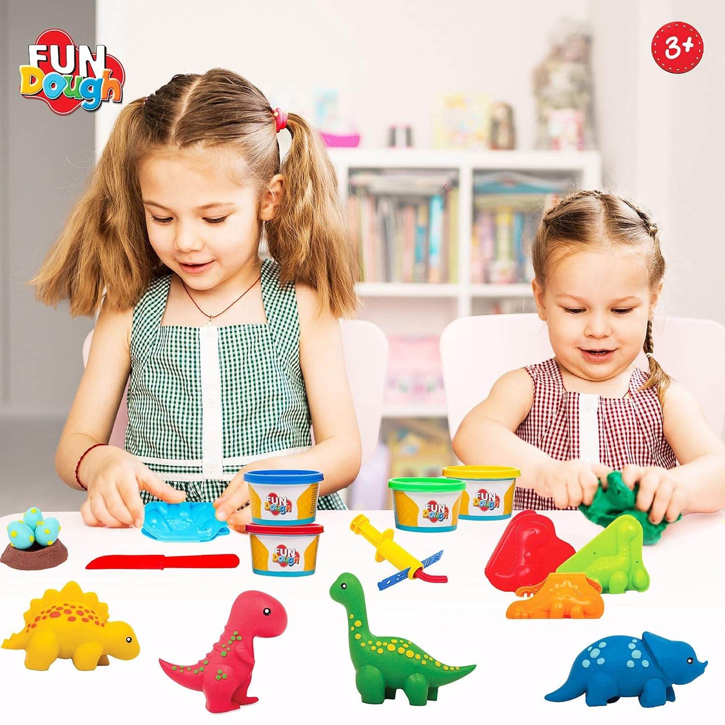 Two girls playing with Fundough Dino Ville modeling clay and colorful dinosaur shapes at a table