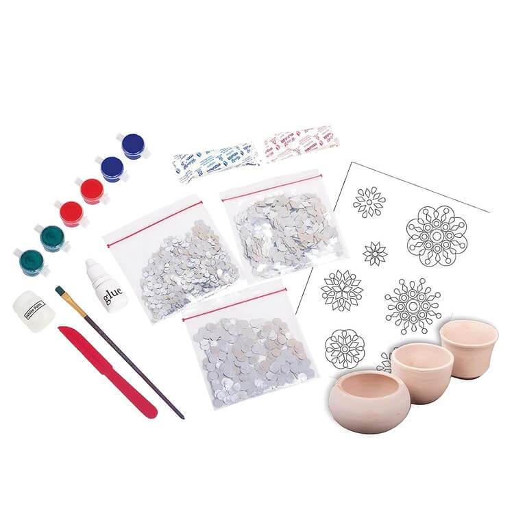 Lippan art kit for kids with paints, glue, brush, spatula, decorative pieces, and design templates