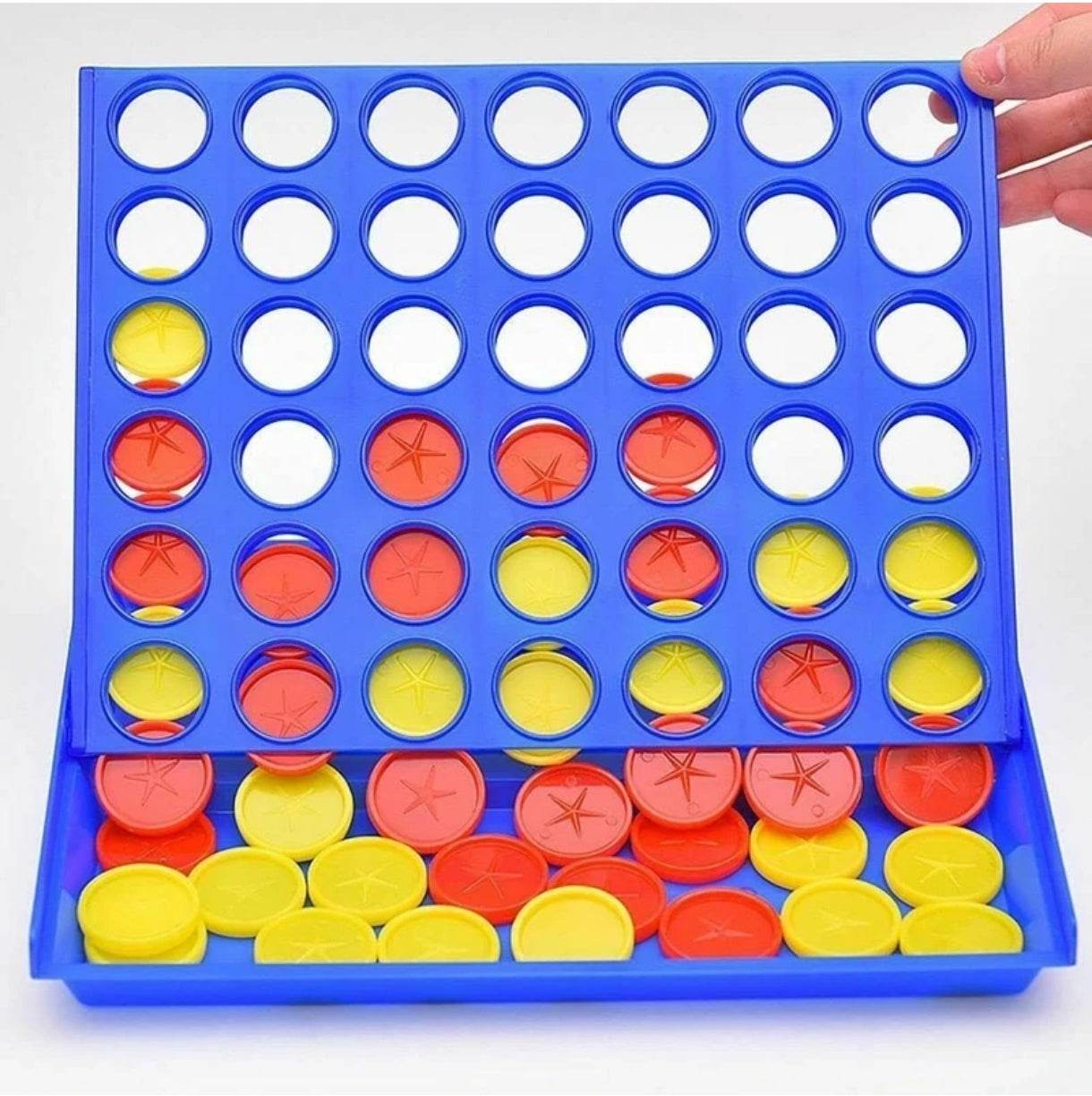 Funskool Strike 4 board game with blue frame and red and yellow game discs in play