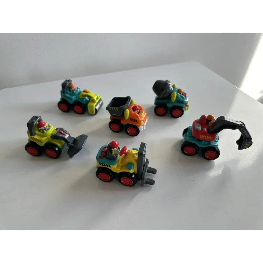 Set of six colorful friction powered construction vehicle toys including excavator bulldozer and forklift on white surface