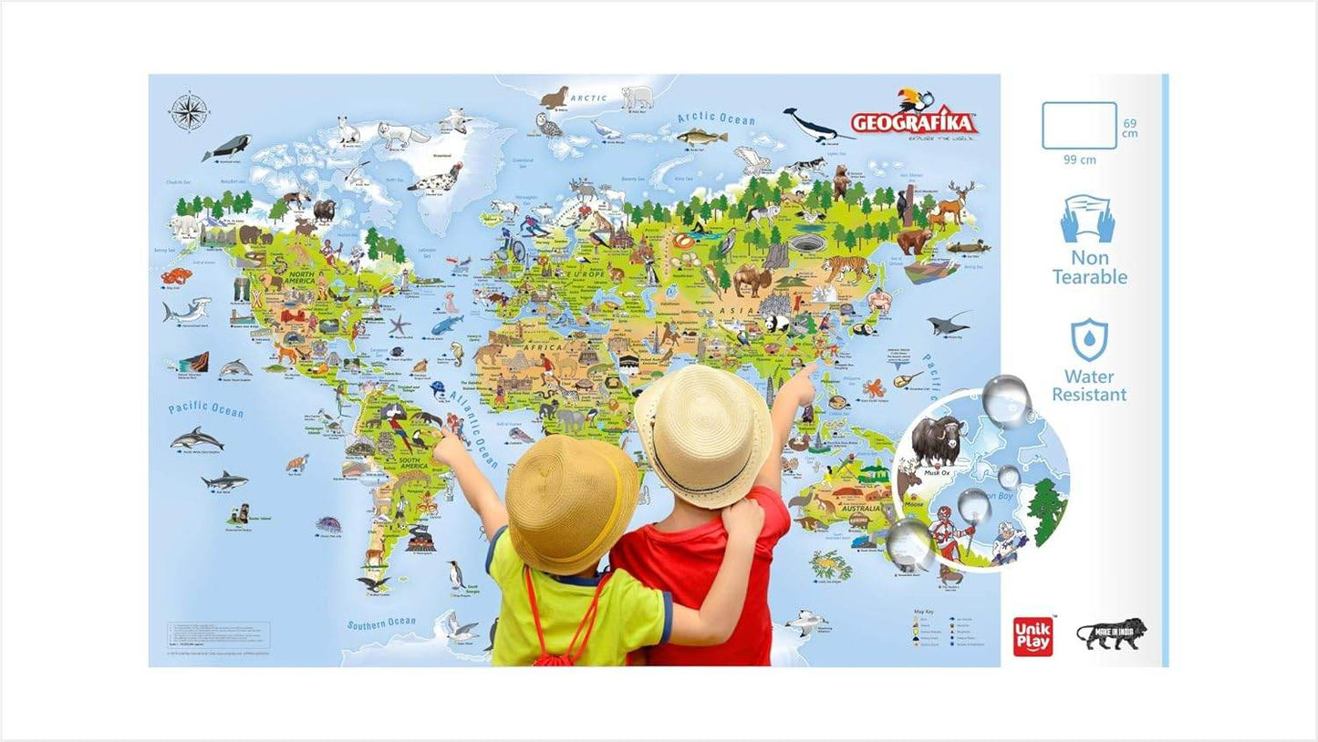 Children playing with a colorful geography board game with cards featuring a detailed world map and animals