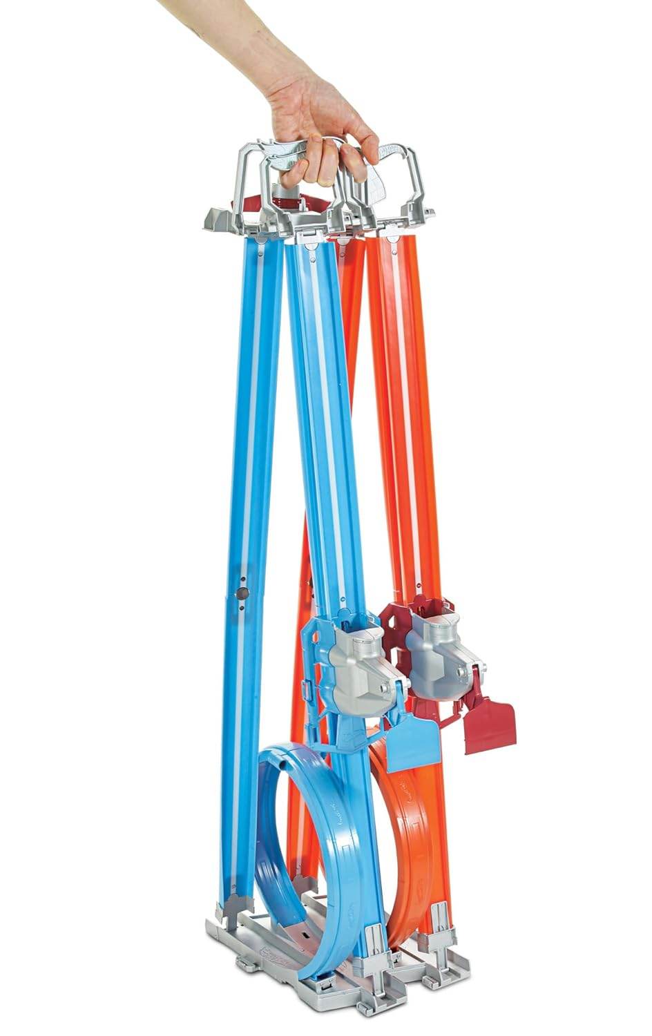 Folded Hot Wheels Action Dual Loop Dash track with blue and red loops held by hand