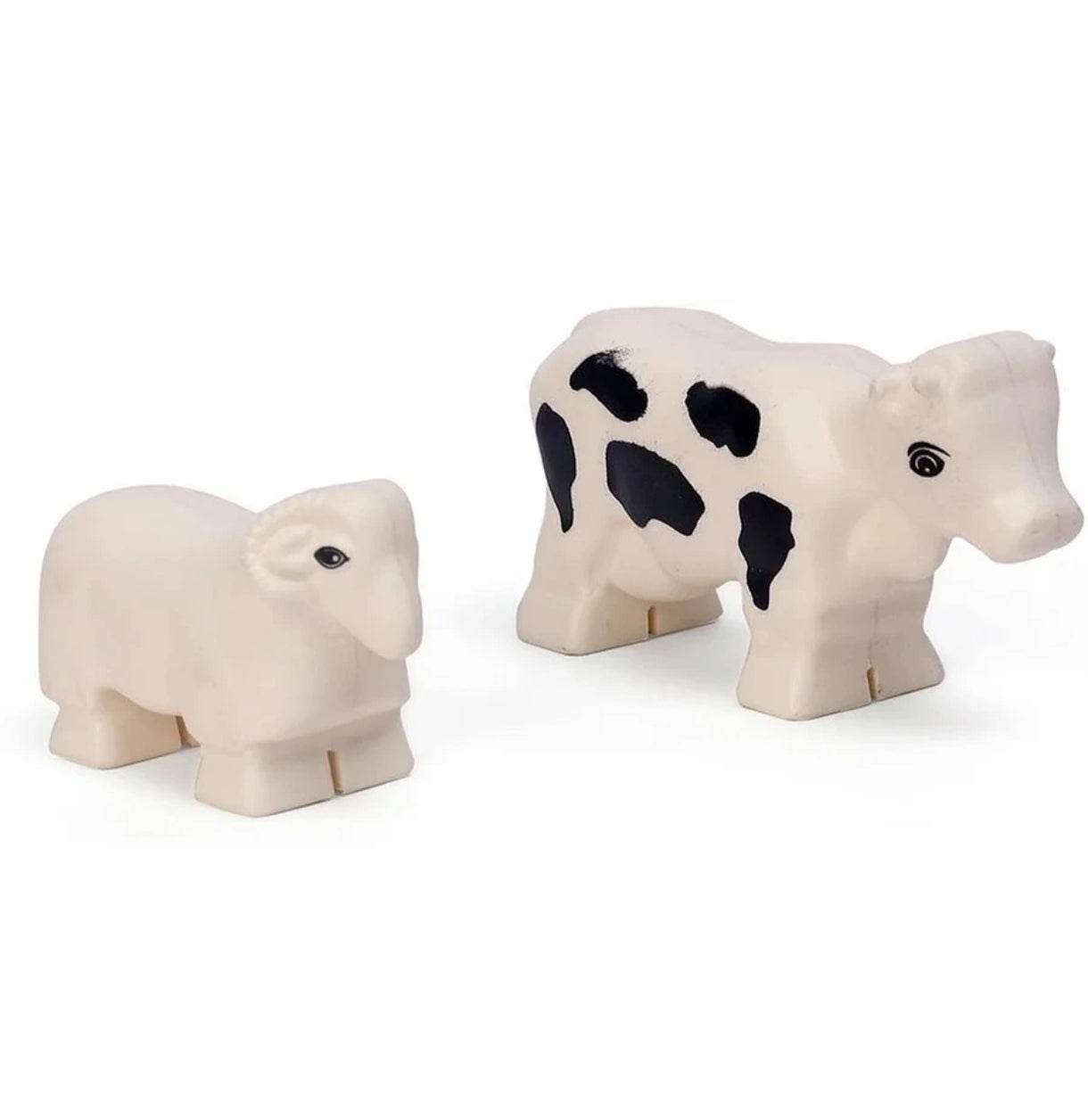 Peacock farm house building blocks for kids featuring white sheep and black spotted cow figures
