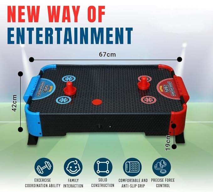Black compact air hockey table for kids and adults with red and blue paddles, measuring 67cm by 42cm