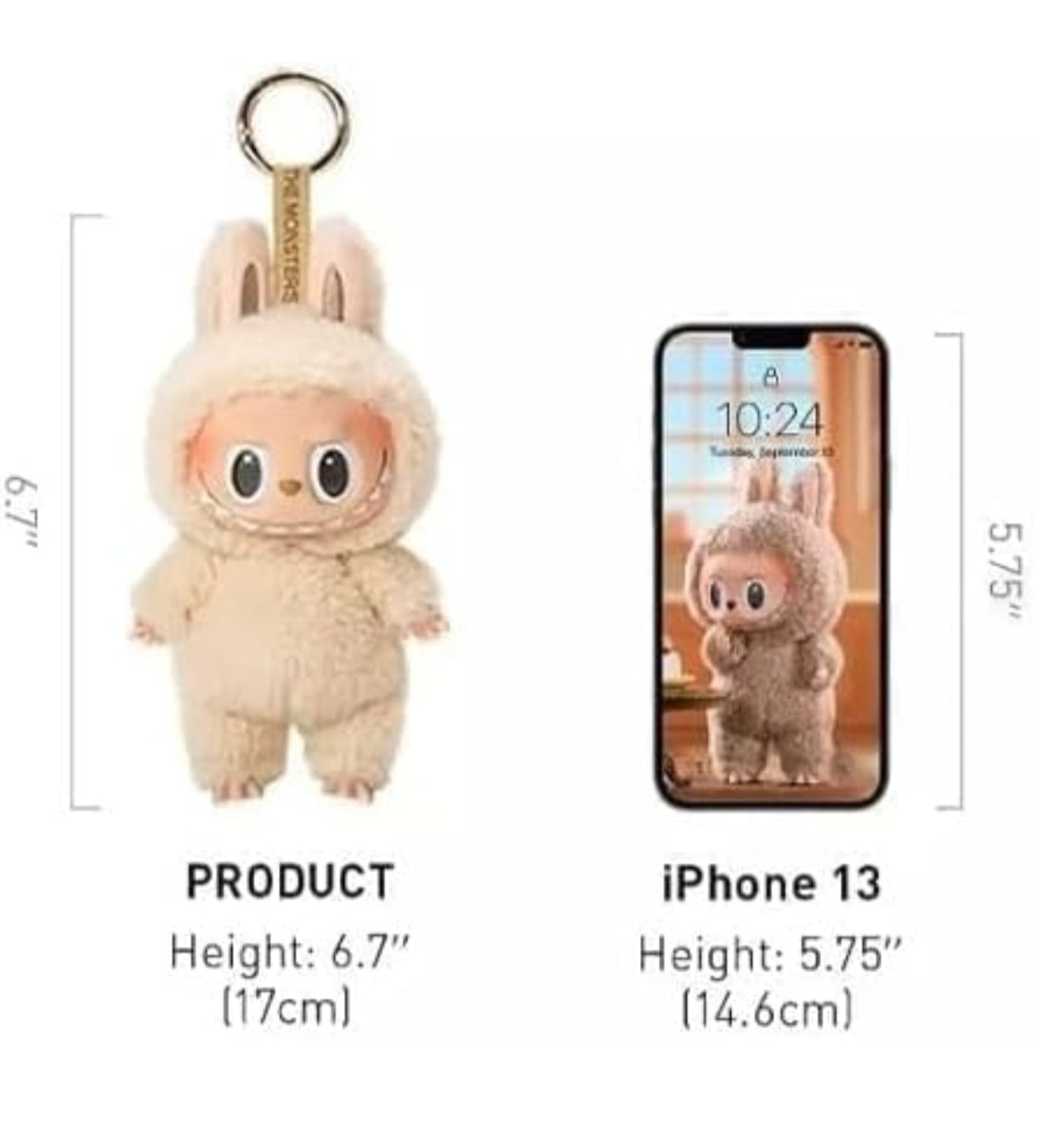 Labubu doll collectible figure keychain in beige fluffy bunny costume comparing size with iPhone 13