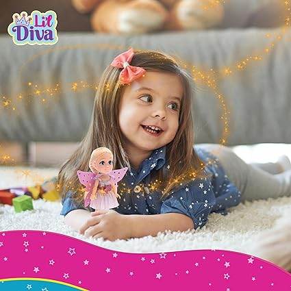 Happy toddler girl playing with fairy doll for girls age 3 wearing a pink dress and wings