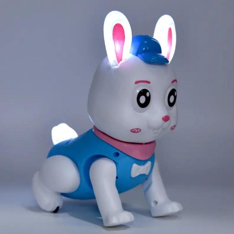T-Rex musical battery operated rabbit toy for kids with glowing ears and blue outfit
