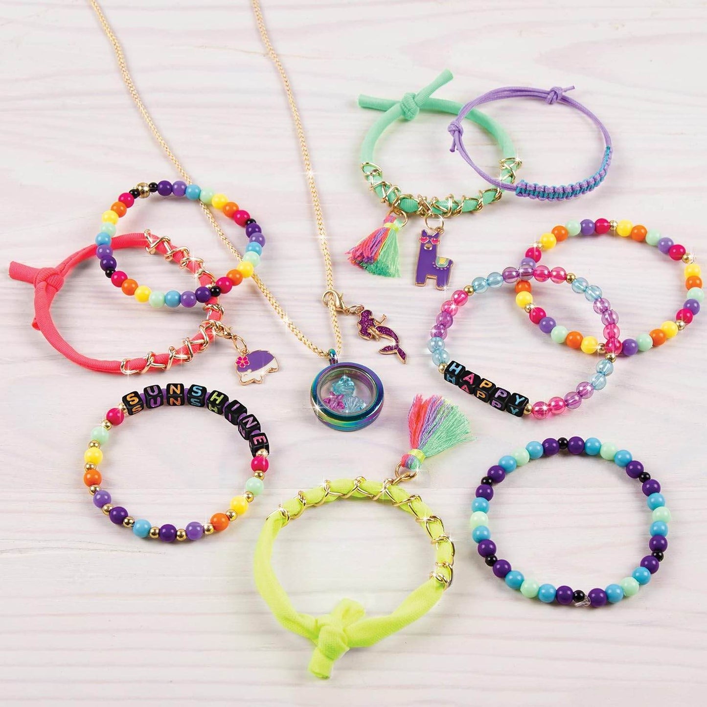 Colorful make your own jewelry set with beads, tassels, charms, and bracelets from T-Rex the toyland Sitamarhi