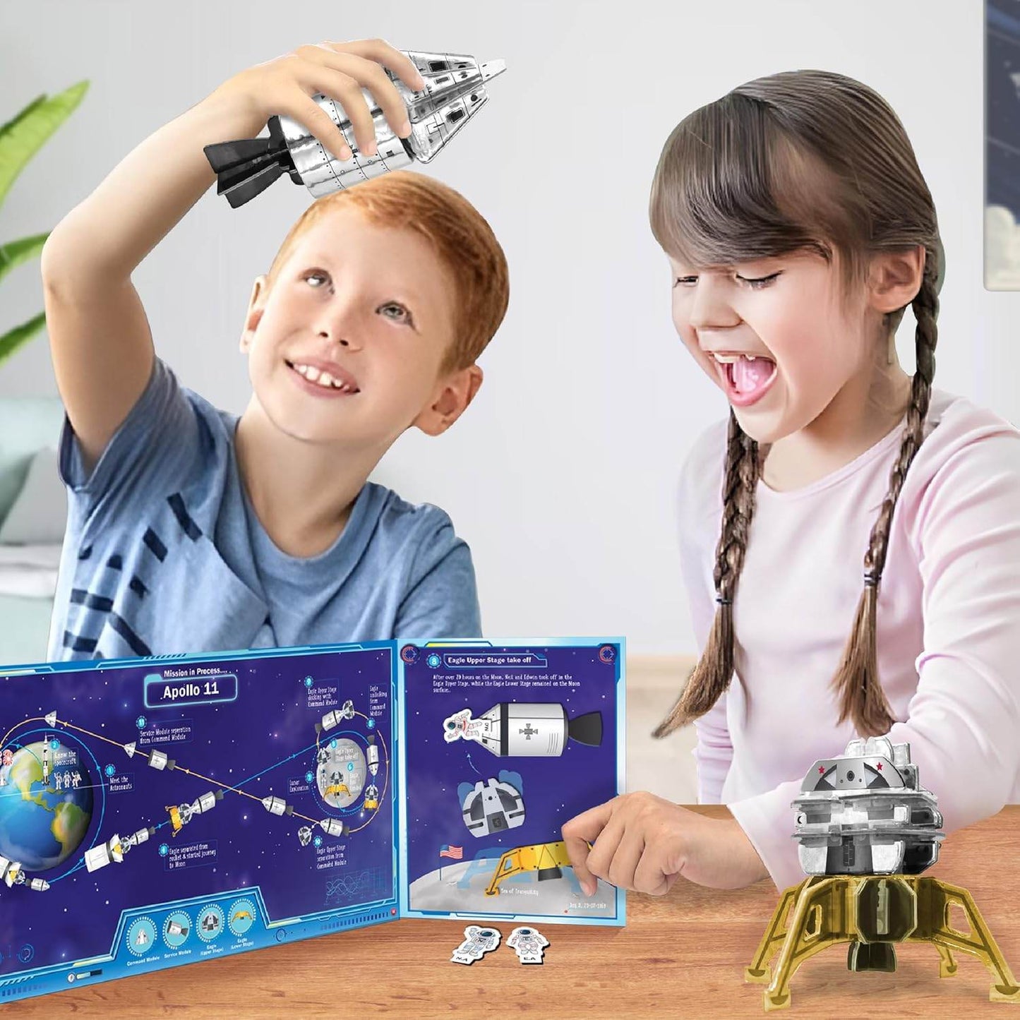 Children playing with 3D rocket puzzle educational toy and space-themed puzzle book on table