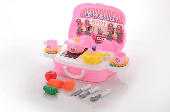 Pink modular kitchen toy set for kids with pots, pans, cups, utensils, and plastic vegetables