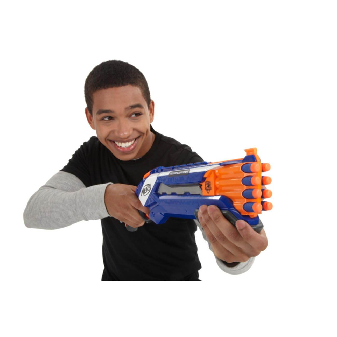 Boy holding and aiming a Nerf Rough Cut 2X4 Elite Blaster toy gun with orange foam darts