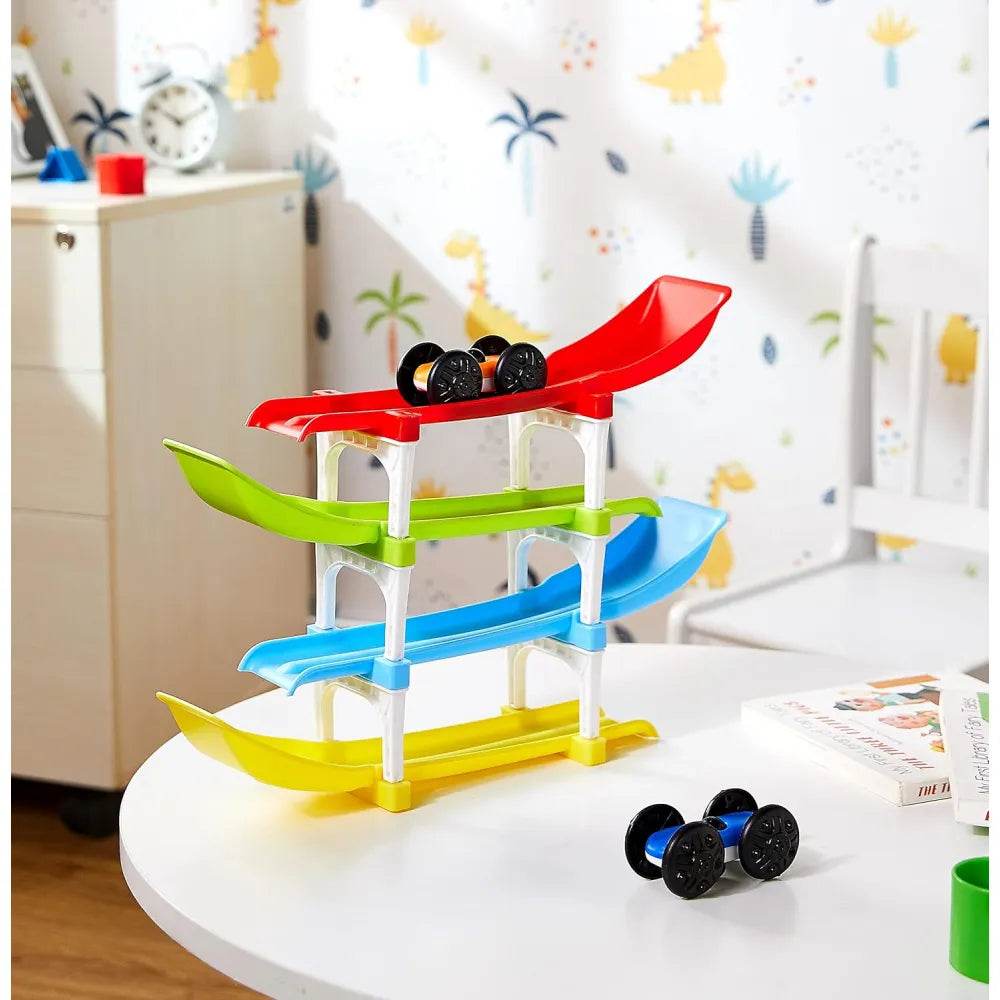 Colorful ramp race track toy for kids with four levels and small black race cars on a white table