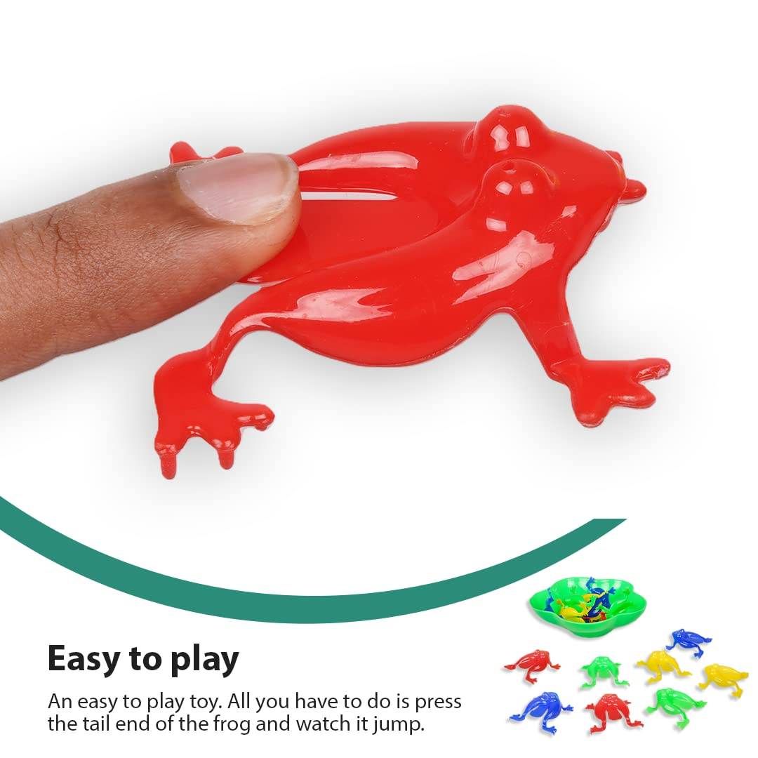 Red plastic frog being pressed to jump in the Jumping Frog board game for kids by T-Rex the toyland Sitamarhi