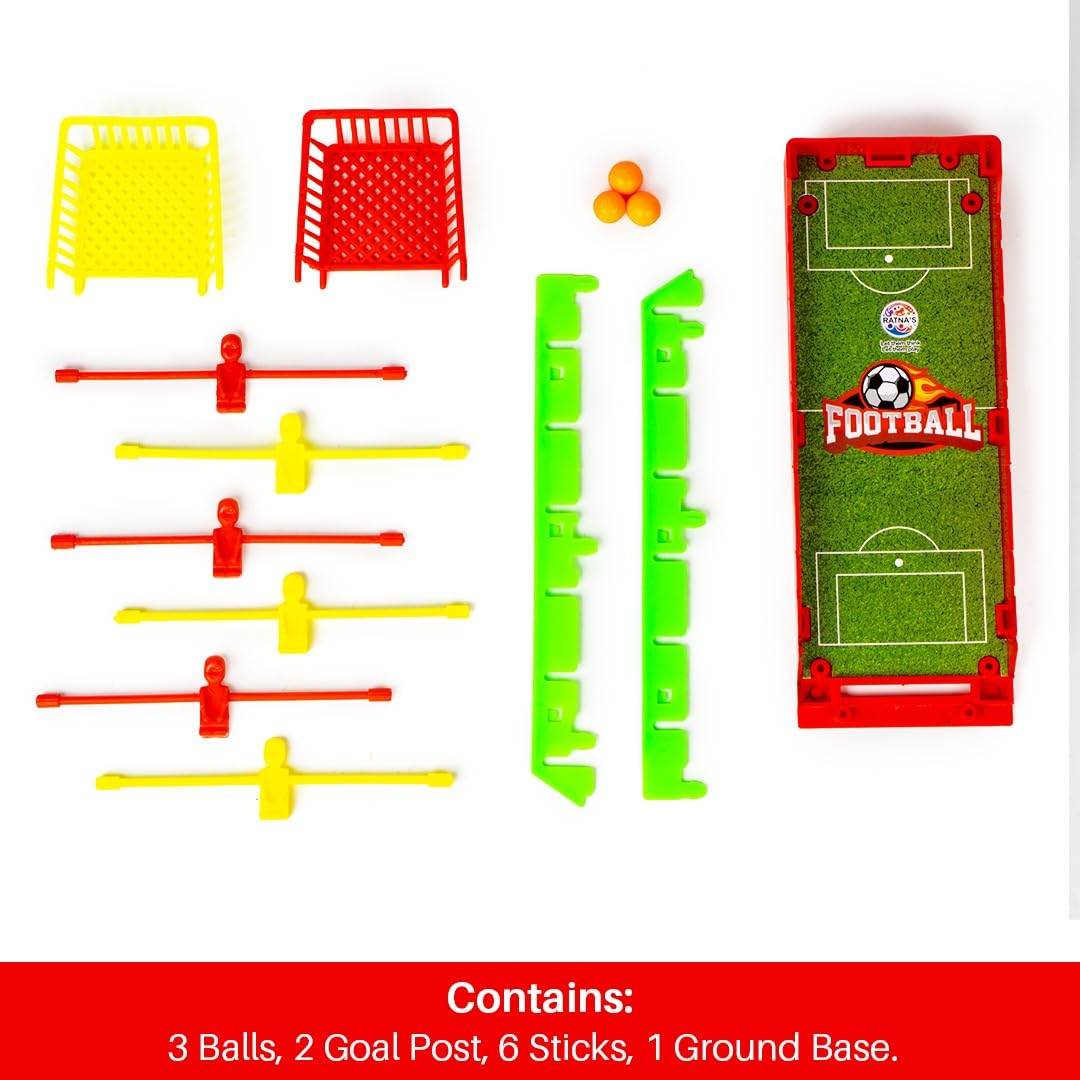 Prem Ratna mini foosball table for kids with green base, red and yellow sticks, two goal posts, and three orange balls