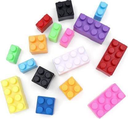 Colorful jumbo building blocks set including red, yellow, blue, green, purple, pink, black, and white pieces