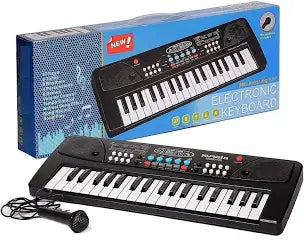 Black electronic keyboard with microphone and blue packaging in the background