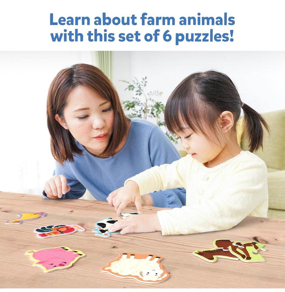 Child and mother playing with My First Puzzle Set Skillmatics farm animal puzzles at wooden table