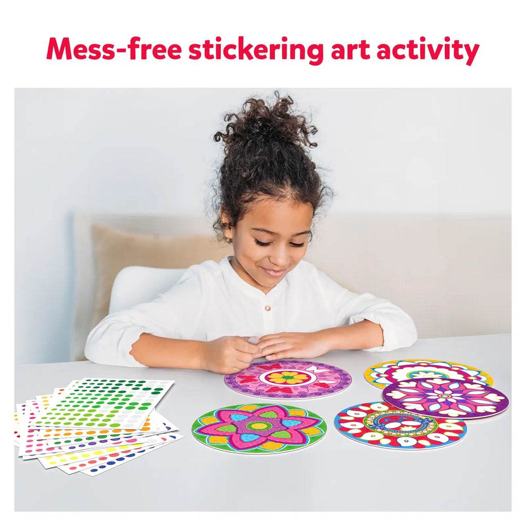Girl creating dot it mandla art using sticker mandala art set India on table with colorful patterns