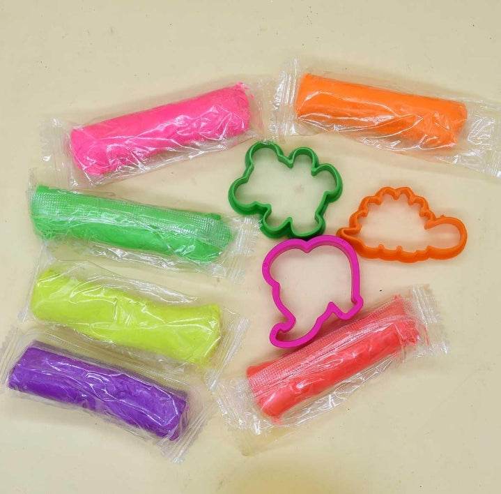Skoodle Wow Surprise Pack toy with colorful modeling clay and shape cutters for creative play