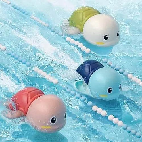 Colorful swimming turtle bath toy for toddlers floating and swimming in a pool with lanes