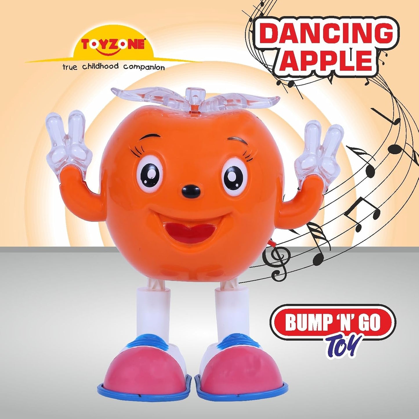 Toyzone dancing apple musical toy with smiling face and blue and pink shoes playing music