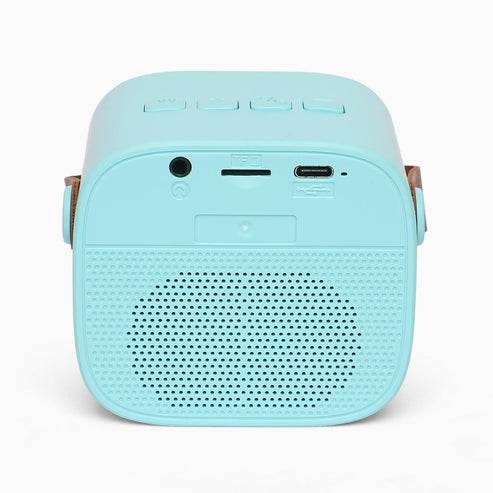 Light blue unicorn karaoke speaker for kids with USB and audio input ports and control buttons