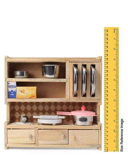 Wooden toy kitchen set with shelves, drawers, and utensils, accompanied by a ruler for scale.