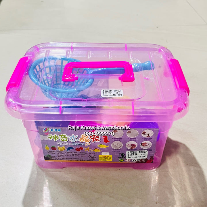 Pink plastic storage box containing colorful 3D printer fidget toys with blue accessories